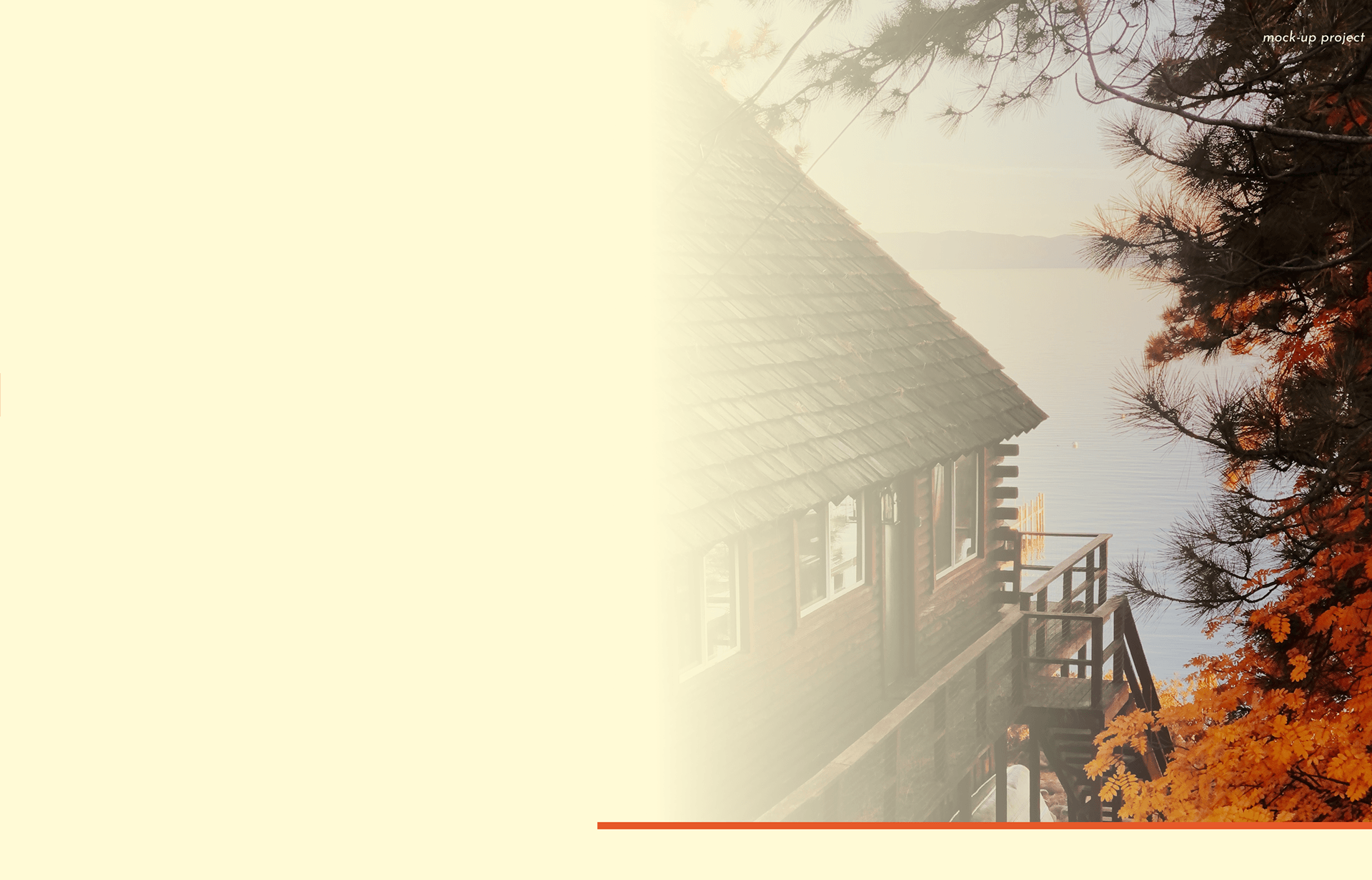 A timber cabin with a shingled roof looking out over a Wisconsin lake at golden hour, framed by autumn pines.